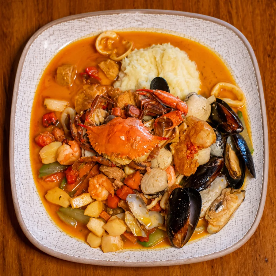 Fiesta del Mar from above: blue crab, mussels, clams, shrimp and squid in sauce
